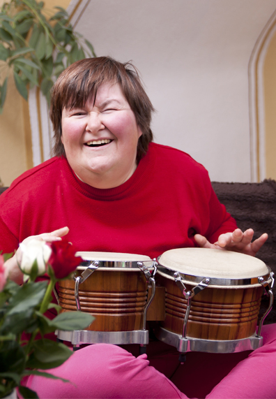 Woman Playing Drums